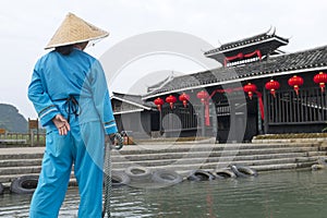 Boat sailor on Li river boat trip, China