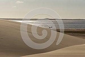 A boat in the sea and dunes - Delta do ParnaÃÂ­ba, LenÃÂ§ois Maranhenses, PiauÃÂ­, Brazil. CearÃÂ¡, Jericoacoara, Barreirinhas, Atins photo