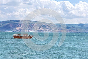 Boat at sea of Galilee photo