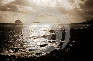 A boat on the sea with strong light effect