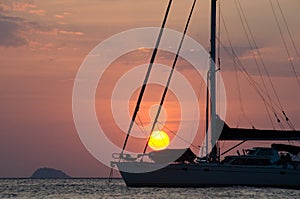 Boat on the sea at sunset in Adang-Ravi Islandsin,Tarutao Nation