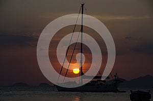 Boat on the sea at sunset in Adang-Ravi Islandsin,Tarutao Nation