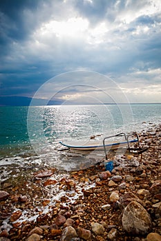 Boat on the shore of the Dead sea in Israel