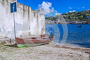 Boat on the shore of San Giulio Island, Lake Orta, Italy.