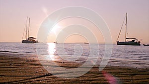 Boat silhoette at sunset in, Ria Formosa. Algarve