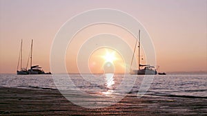 Boat silhoette at sunset in Ria Formosa. Algarve