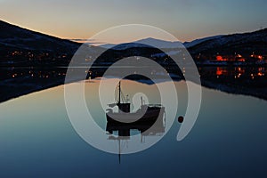 Boat silhouette in Norwegian fjords