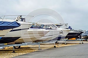 Boat on stand on the shore, close up on the part of the yacht, l