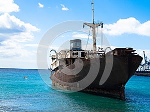 Boat stranded on the coast. Lanzarote, Spain, Europe. Lost Place