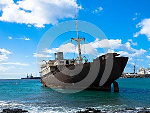 Boat stranded on the coast. Lanzarote, Spain, Europe. Lost Place
