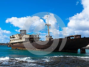 Boat stranded on the coast. Lanzarote, Spain, Europe. Lost Place