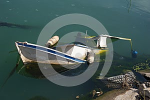 Boat submerged and abandoned due to neglect