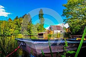 Boat and summer house , tranquil surroundings