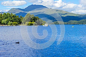 Boat on a sunny day at Loch Lomond in Luss, Scotland, UK, 21 July, 2016