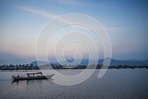 Boat at sunset in kampot riverside cambodia