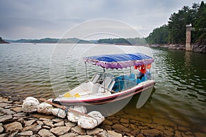 The boat on Teanding lake in China photo