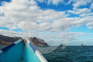 On a boat to Shauab beach, mountains, sands, western cape, Socotra, Yemen