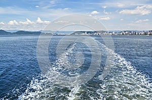 Boat trail in the sea, city of Santos