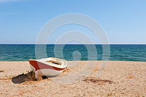 Boat on the tranquil beach