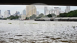 Boat Transportation on Chao Phraya River at Phra Pok Klao Bridge