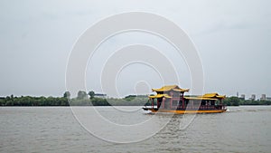 Boat traveling on South Lake in Jiaxing, China