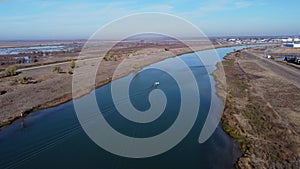 Boat traveling up the deep water channel towards Sacramento