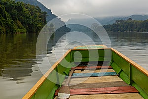 Boat travelling on Nam Ou river, La