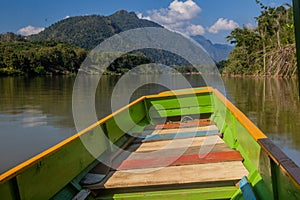 Boat travelling on Nam Ou river, La