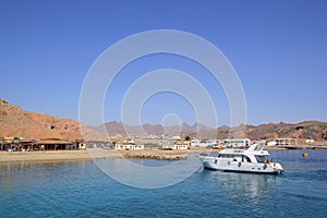 Boat trip to the coral reefs of Tiran Island. The area attracts divers and snorkelers. Clear water, with many lagoons and coral