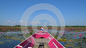 Boat trip to the sea of red lotus, Phatthalung, Thailand