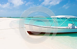 Boat at the tropical beach, Los Roques photo