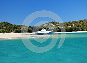 Boat In The Turquoise Water Of The Tropical Bay Of Great Keppel Island Queensland Australia