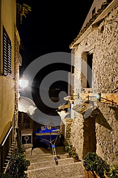 The boat between two houses.