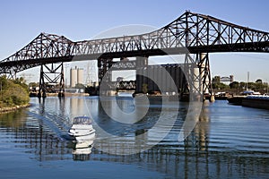 Boat under Chicago Skyway photo