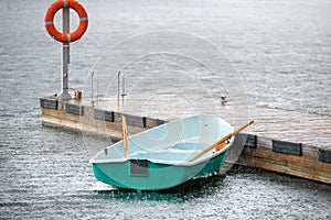 Boat under the summer rain