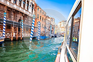 Boat on Venice channel waterfront view