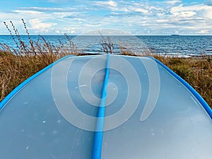 Boat waiting on the beach for his next mission.