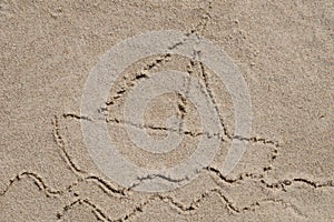 Boat on water - drawing on sand