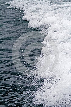 Boat Wave ocean trace on blue sea fresh water background