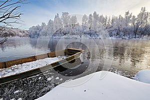 The boat on the winter river