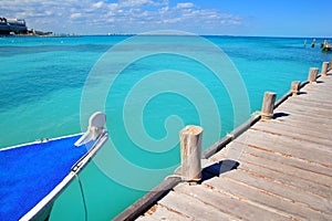 Boat in wood pier Cancun tropical Caribbean sea