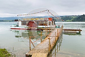 Boat at wooden pier on the Czorsztyn lake