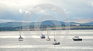 Boat and yachts moored on the Cromarty Firth.