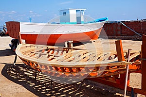 Boat yard with wooden fishing boat