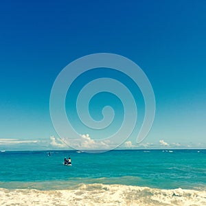 Boater off beach in Maui, Hawaii