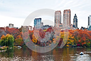 Boaters at The Lake in Central Park, New York in Autumn