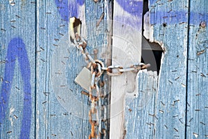 Boathouse door with lock and chain