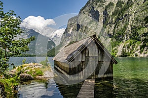 Boathouse at Obersee Lake behind the Watzmann massif, Salet at Koenigssee, Berchtesgaden National Park, Germany