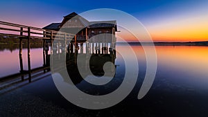 Boathouse in Stegen at the Ammersee at sunset in Bavaria Germany