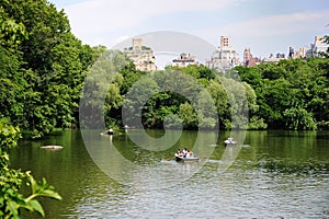 Boating in Central Park on a hot summer day